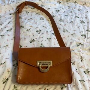 Super cute brown leather fanny pack.